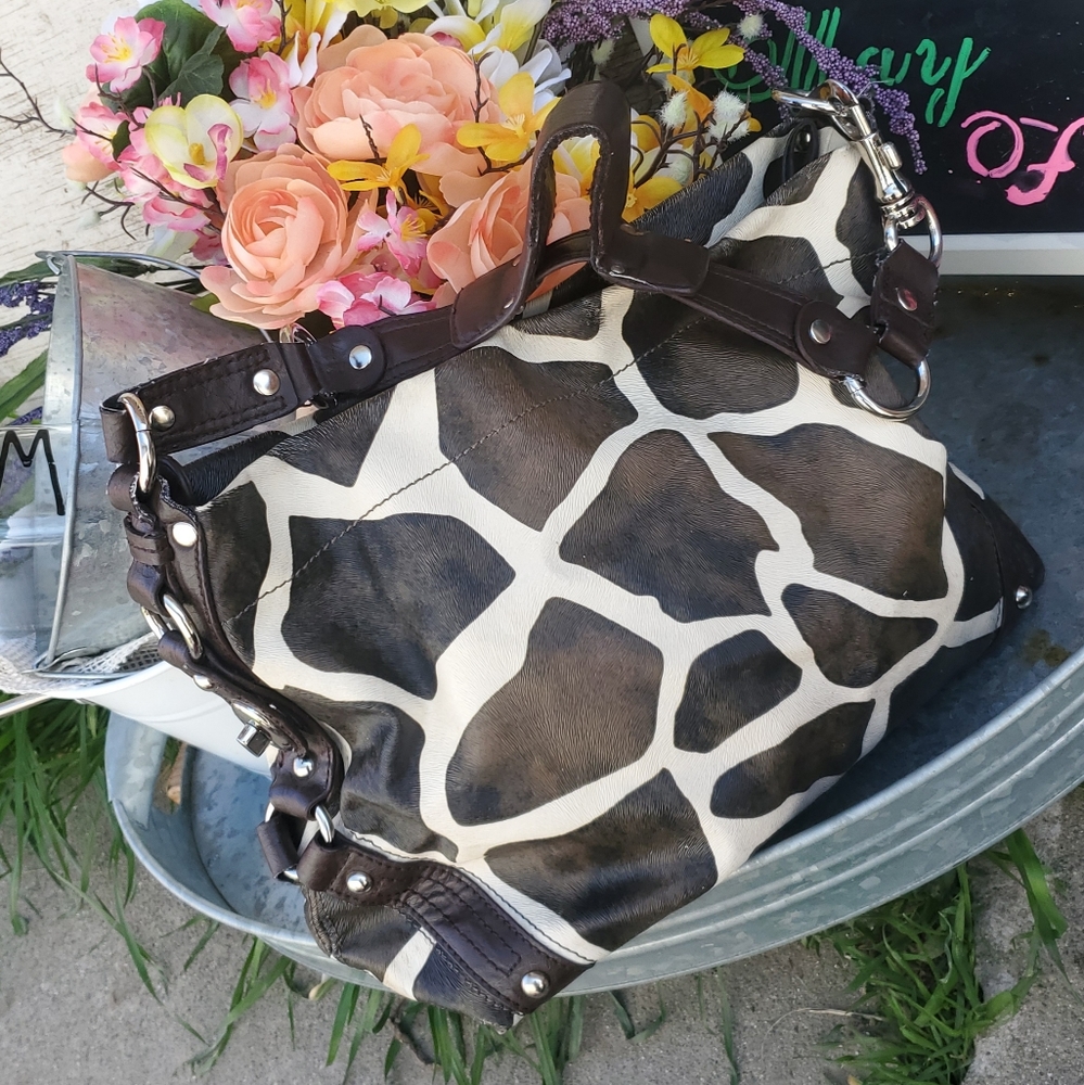Cattle print leather bag